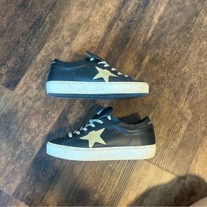 Golden Goose black sneakers